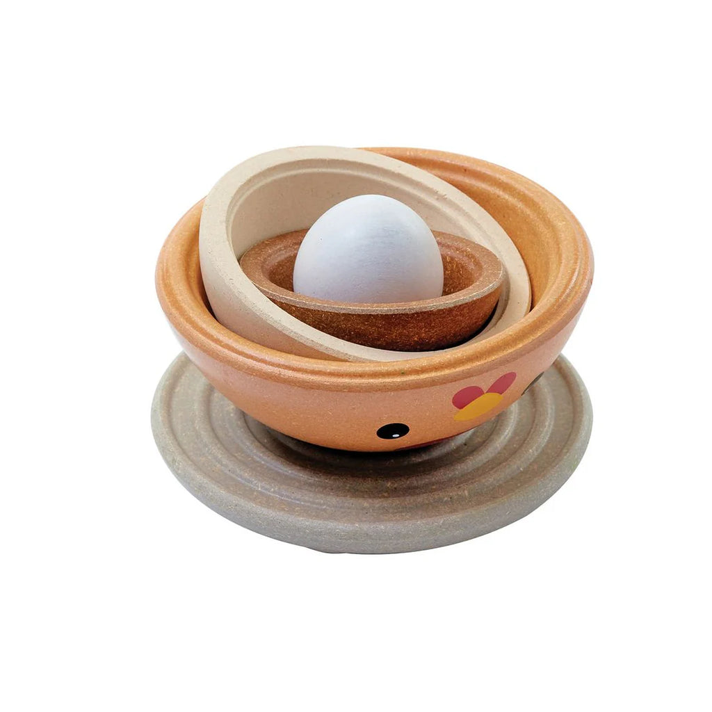 Image of Rustic Chicken Nesting set from Plan Toys nesting inside each other